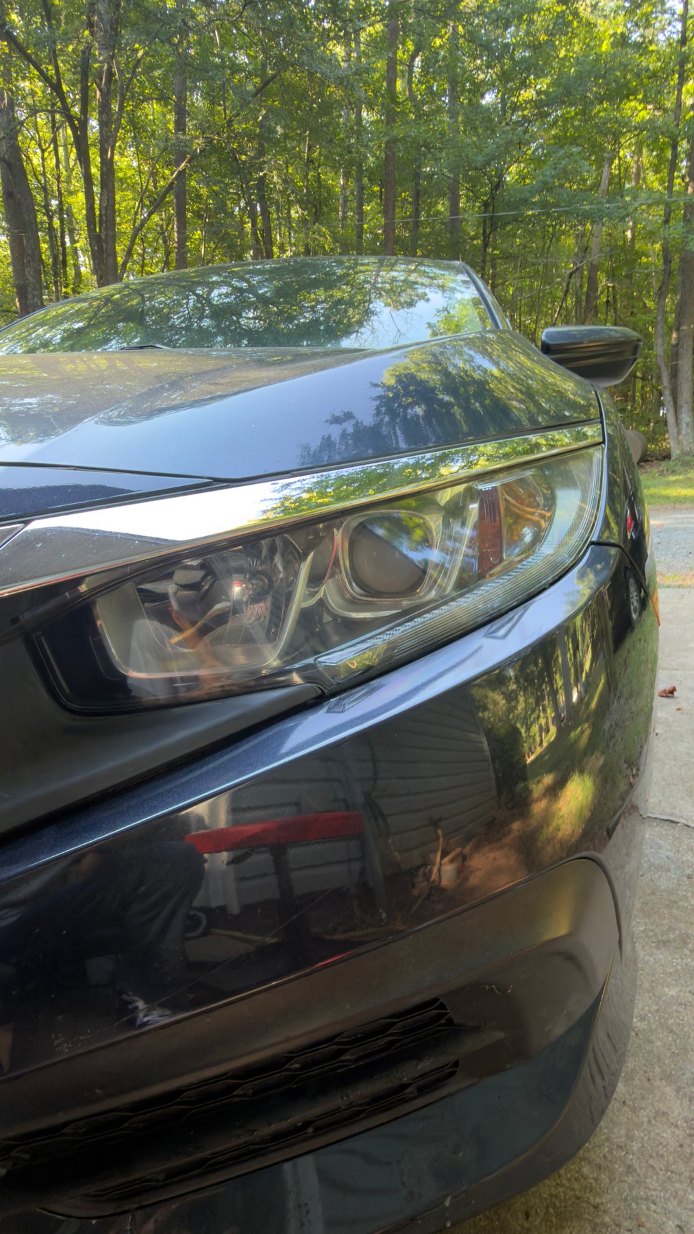 Clear Honda Civic headlight after restoration